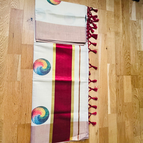 Kerala Set Saree with multicolour round designs and thick contrast border.