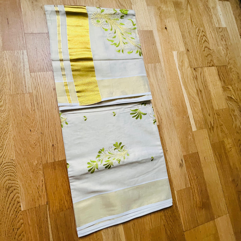 Kerala Set Saree  with flower bunch and thick golden border.